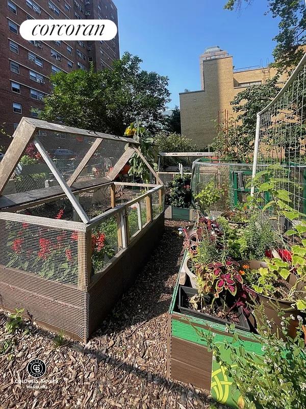 235 Adams St Unit 7B, New York City, NY 11201 - view of yard featuring a vegetable garden