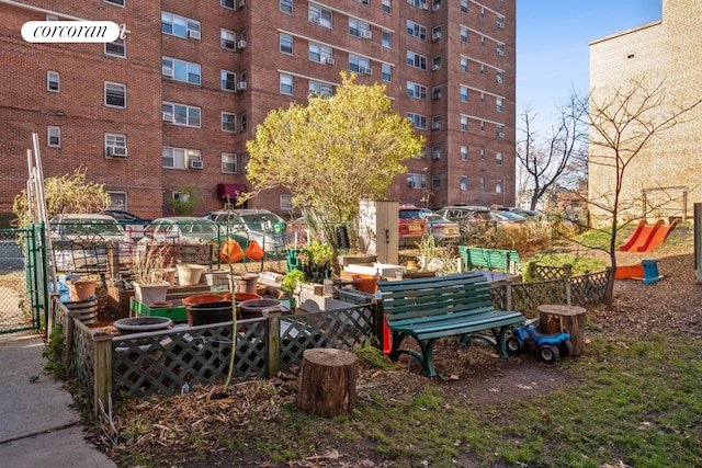 surrounding community featuring fence