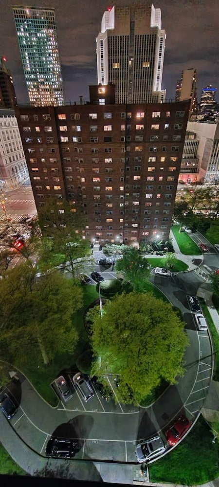 view of property with a view of city lights