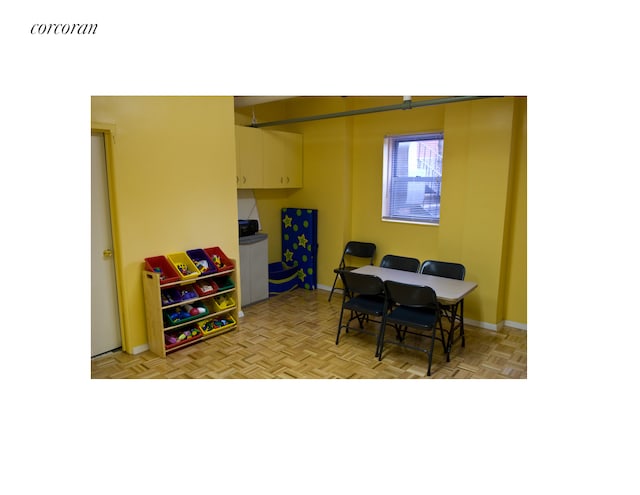 office area featuring baseboards and visible vents