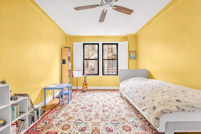 320 W 89th St Unit 3Cd, New York City, NY 10024 - bedroom with baseboards, ceiling fan, and wood finished floors