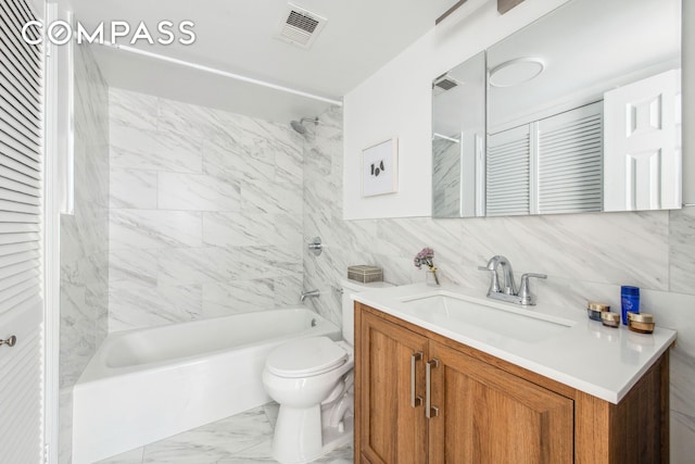 bathroom with visible vents, tub / shower combination, toilet, marble finish floor, and vanity