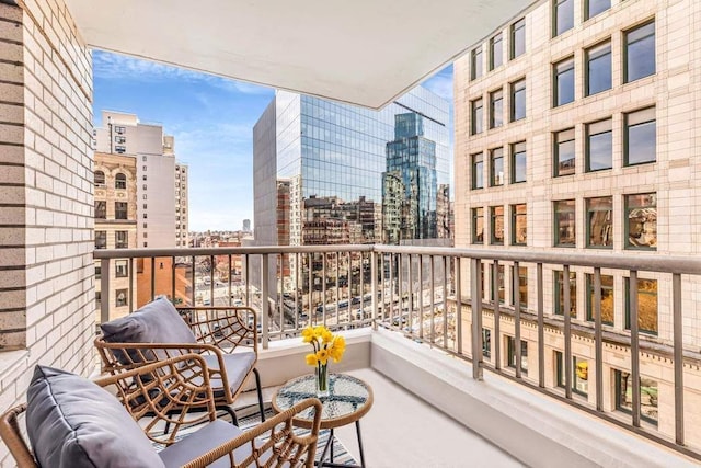 balcony featuring a view of city