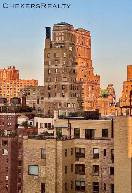 view of building exterior with a view of city