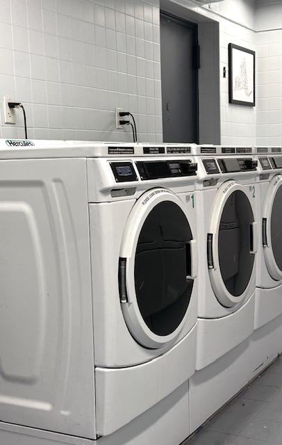 common laundry area featuring washer and dryer