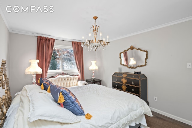 bedroom featuring baseboards, an inviting chandelier, wood finished floors, and crown molding