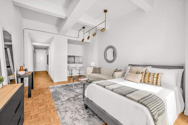 bedroom featuring beam ceiling