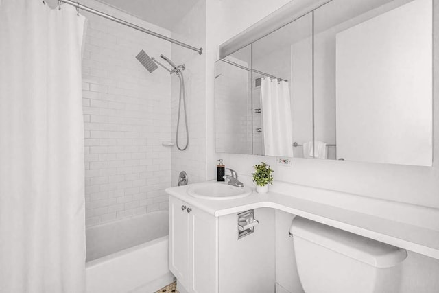 full bathroom with vanity, toilet, and shower / bath combo with shower curtain