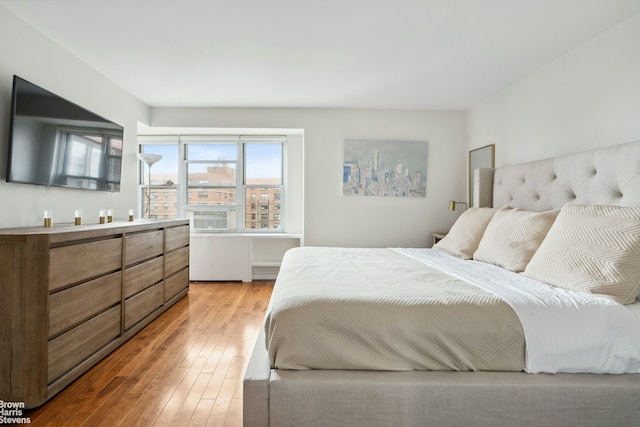 bedroom featuring light wood-type flooring