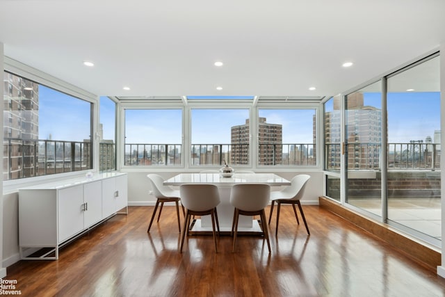 sunroom with a city view