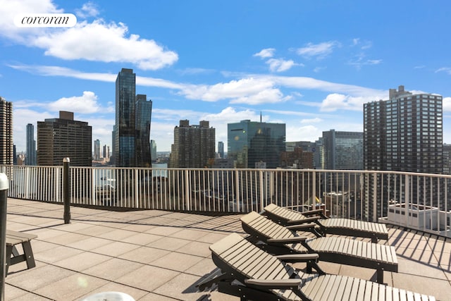 view of patio with a city view