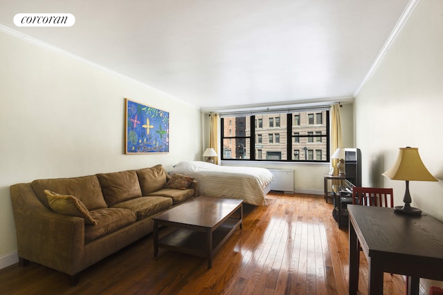 225 E 36th St Unit 2B, New York City, NY 10016 - bedroom with ornamental molding, hardwood / wood-style flooring, and baseboards