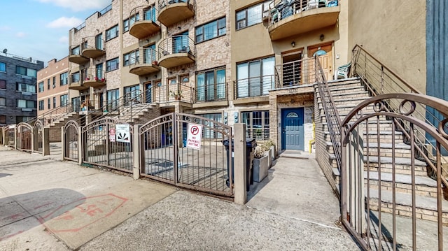 view of building exterior featuring fence