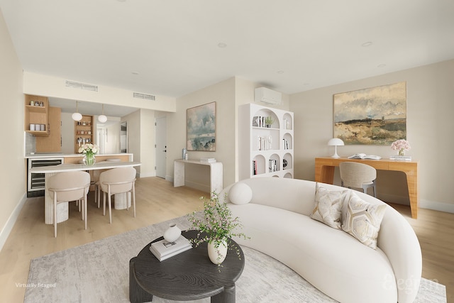 living area with light wood-type flooring, visible vents, an AC wall unit, wine cooler, and baseboards