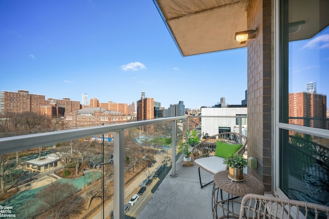 balcony featuring a city view