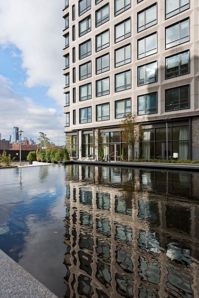 exterior space with a view of city and a water view