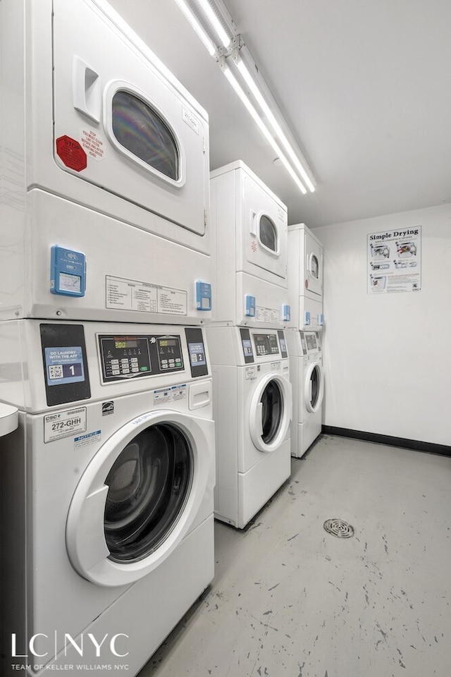 shared laundry area featuring washer and dryer and stacked washing maching and dryer