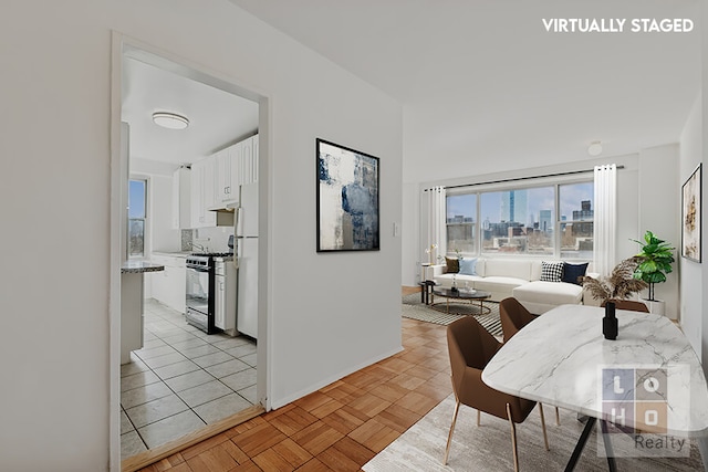 dining space featuring a city view