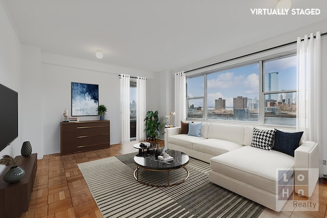 living room featuring a view of city