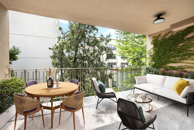 view of patio with a balcony and an outdoor hangout area