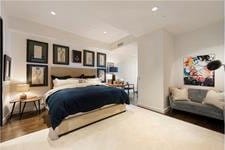 bedroom with wood finished floors and recessed lighting