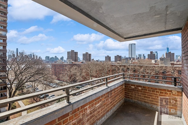 balcony featuring a city view