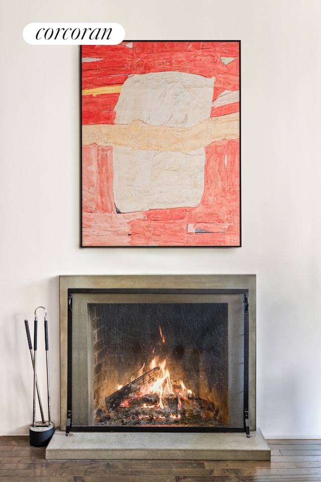 details with a warm lit fireplace