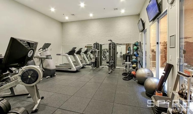 gym with recessed lighting