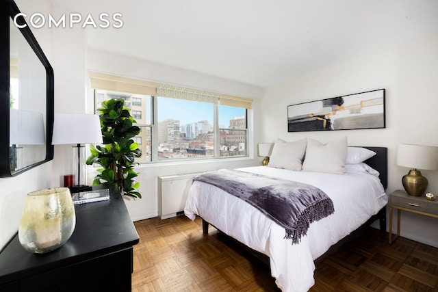 bedroom featuring a view of city