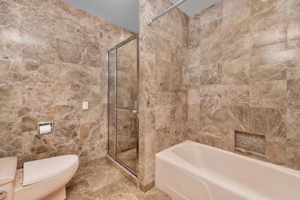 full bathroom with a tub to relax in, an enclosed shower, toilet, and tile walls