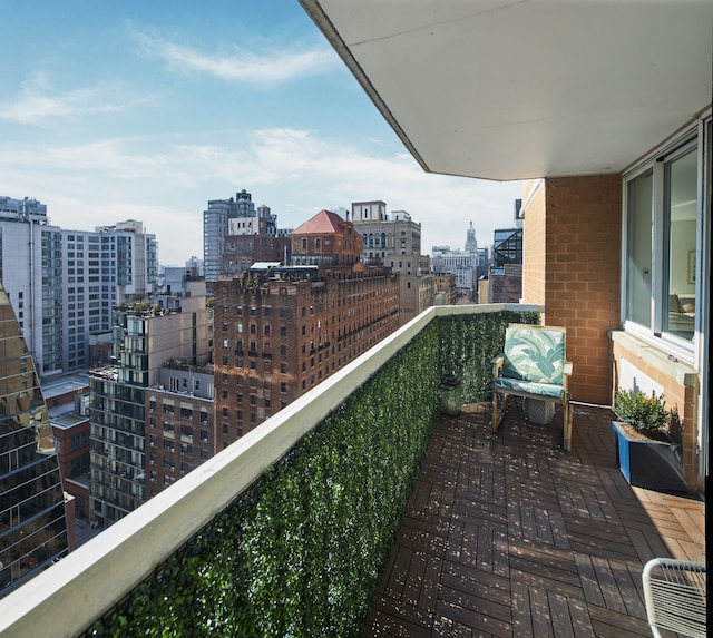 balcony featuring a city view