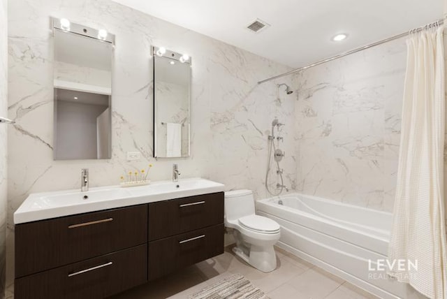 full bathroom with shower / tub combo with curtain, visible vents, toilet, and a sink