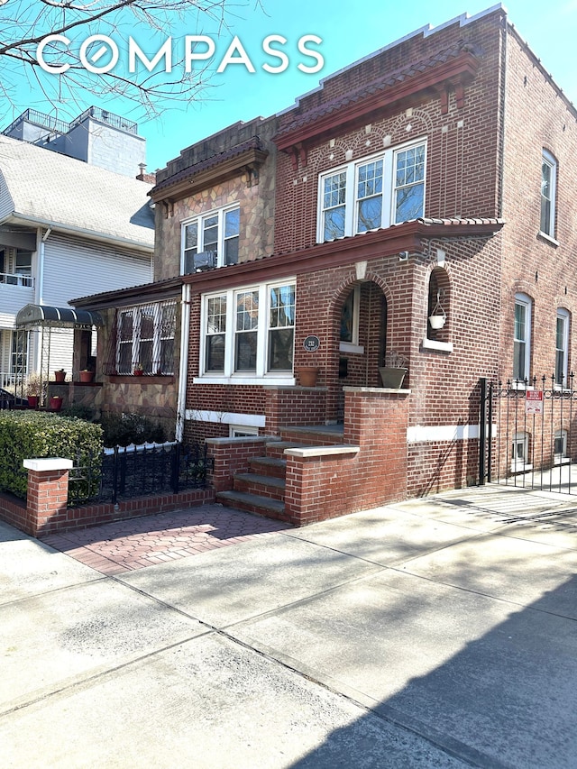 view of front facade with brick siding