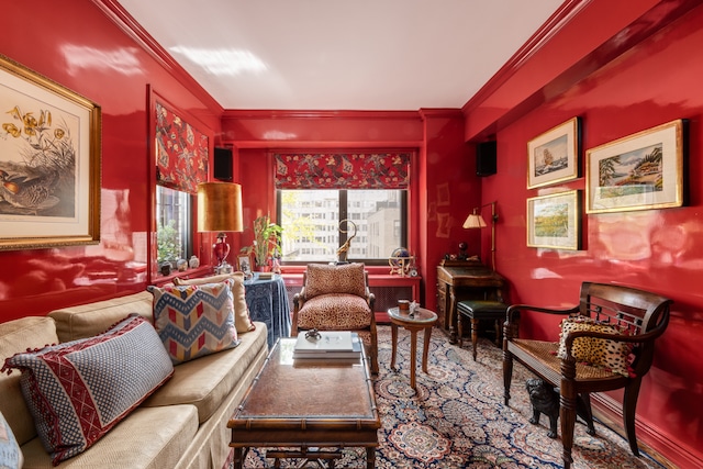 sitting room featuring crown molding