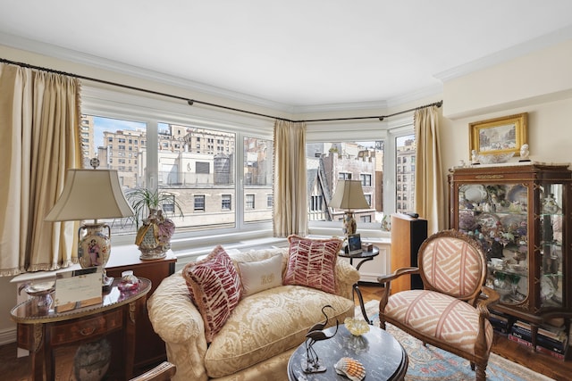 interior space with wood finished floors and ornamental molding