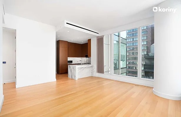 unfurnished living room featuring light wood-style floors