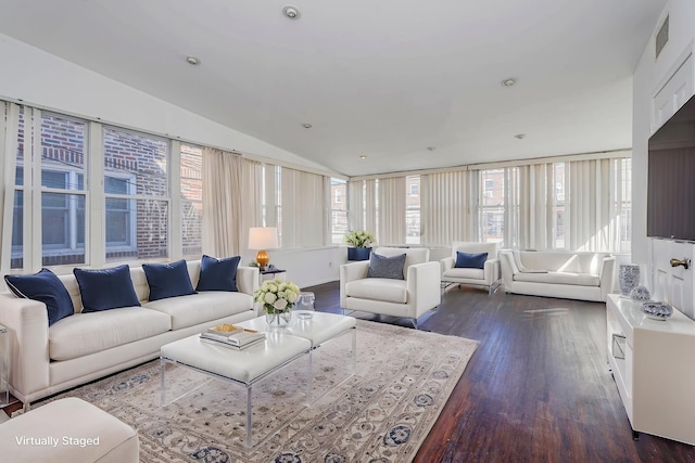 living area featuring dark wood-style floors, visible vents, recessed lighting, and lofted ceiling