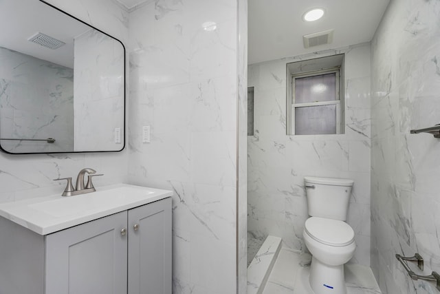 full bathroom featuring visible vents, toilet, marble finish floor, and vanity