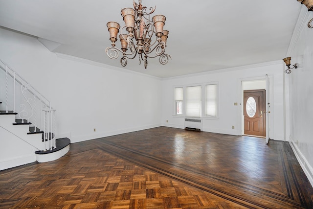 entryway featuring crown molding, stairway, radiator, and baseboards