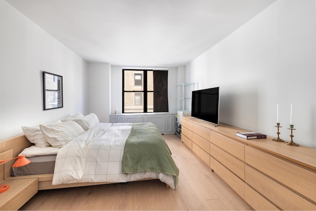 bedroom with light wood-style flooring