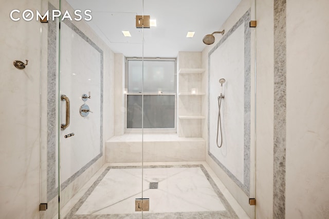 bathroom with a marble finish shower