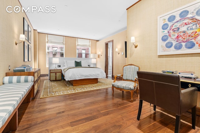 bedroom featuring wood finished floors
