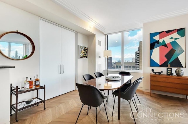 15 W 63rd St Unit 21-A, New York City, NY 10023 - dining area featuring visible vents and crown molding