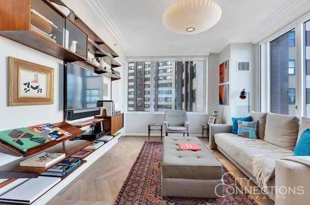 15 W 63rd St Unit 21-A, New York City, NY 10023 - living room featuring crown molding, visible vents, and baseboards
