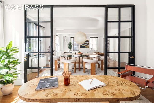 dining area with wood finished floors