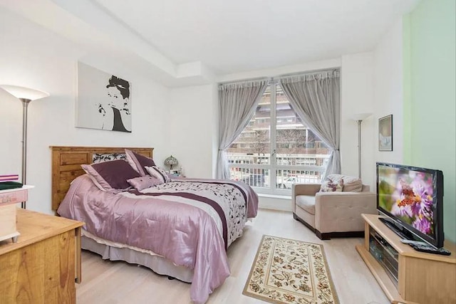 bedroom featuring wood finished floors