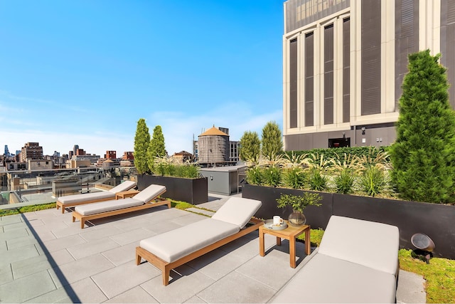 view of patio with a city view