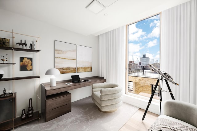 home office with a city view and wood finished floors