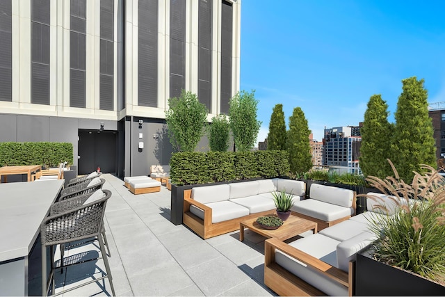 view of patio / terrace featuring an outdoor hangout area and outdoor dining area