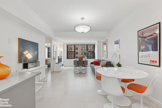 305 E 40th St Unit 18H, New York City, NY 10017 - dining space featuring ornamental molding and light tile patterned floors